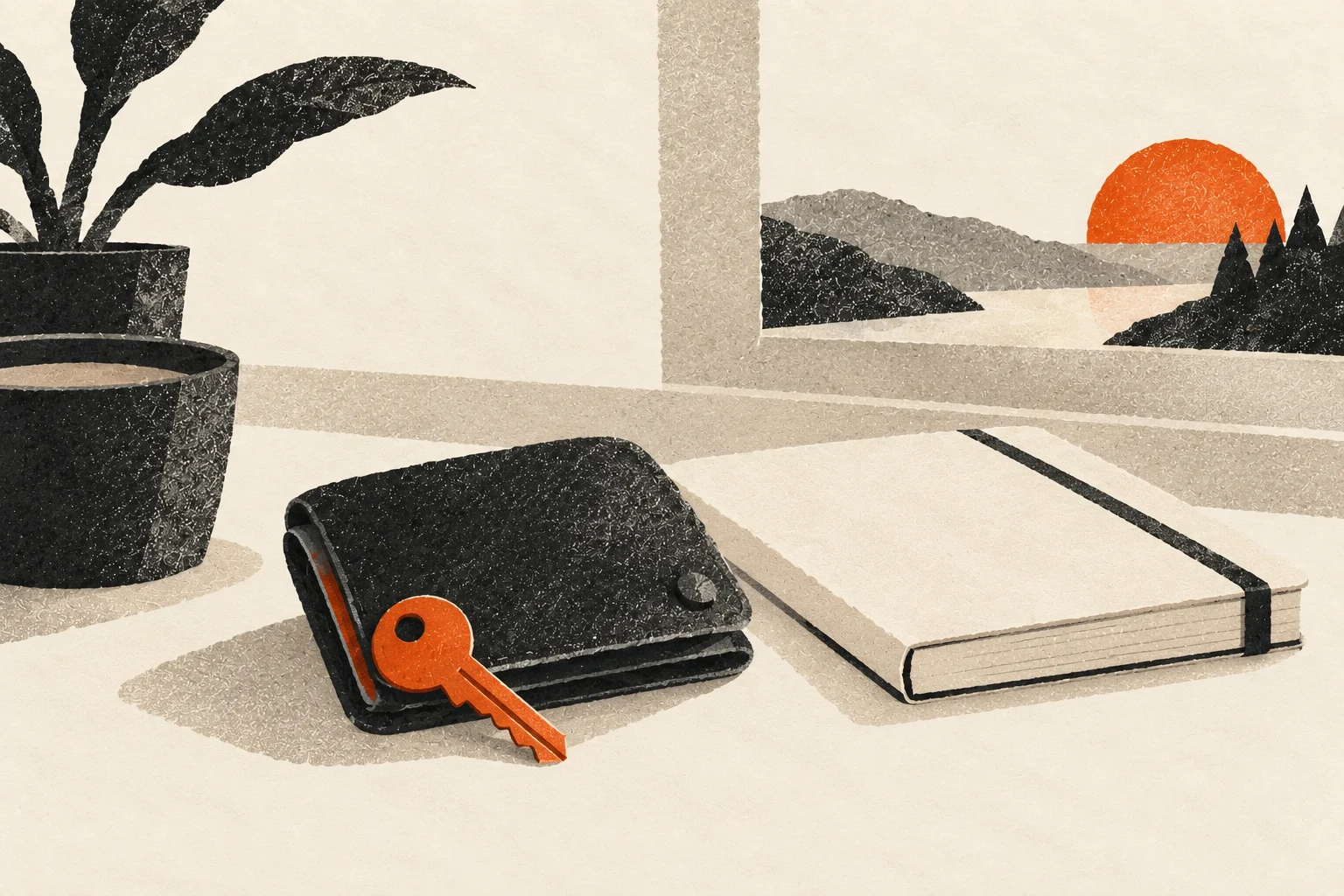 A personal wallet and key sit beside a closed notebook.